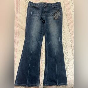 VintageWomen’s Dark Blue Slim Flare Jeans with Embroidered Blue Rose Detail